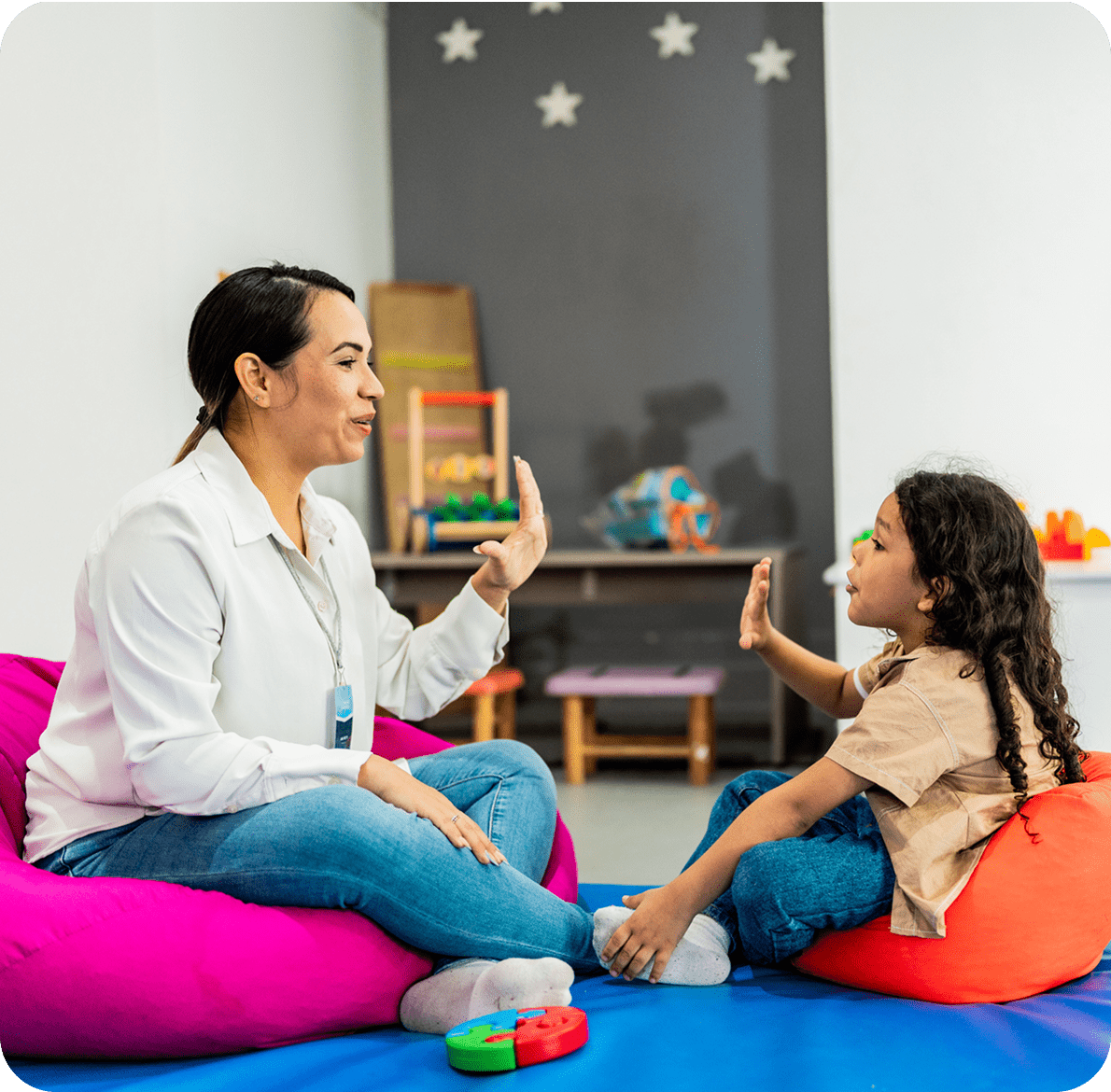 Child and therapist interaction in playroom