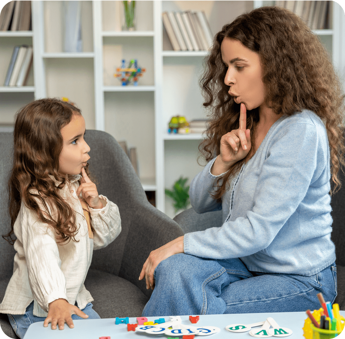 Woman and child communicating silently