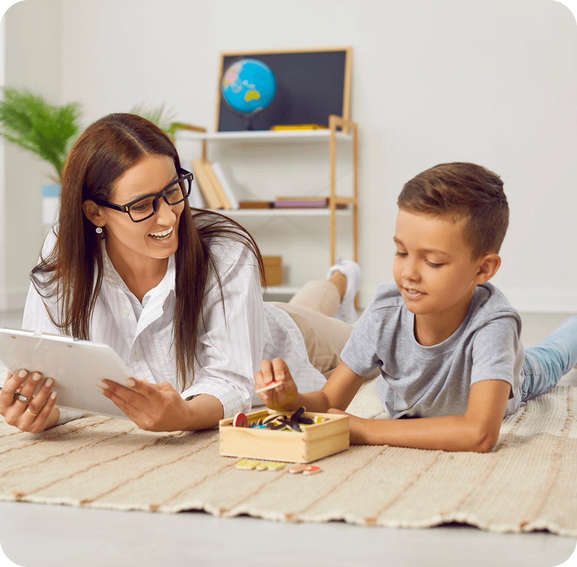 Smiling woman and child with tablet