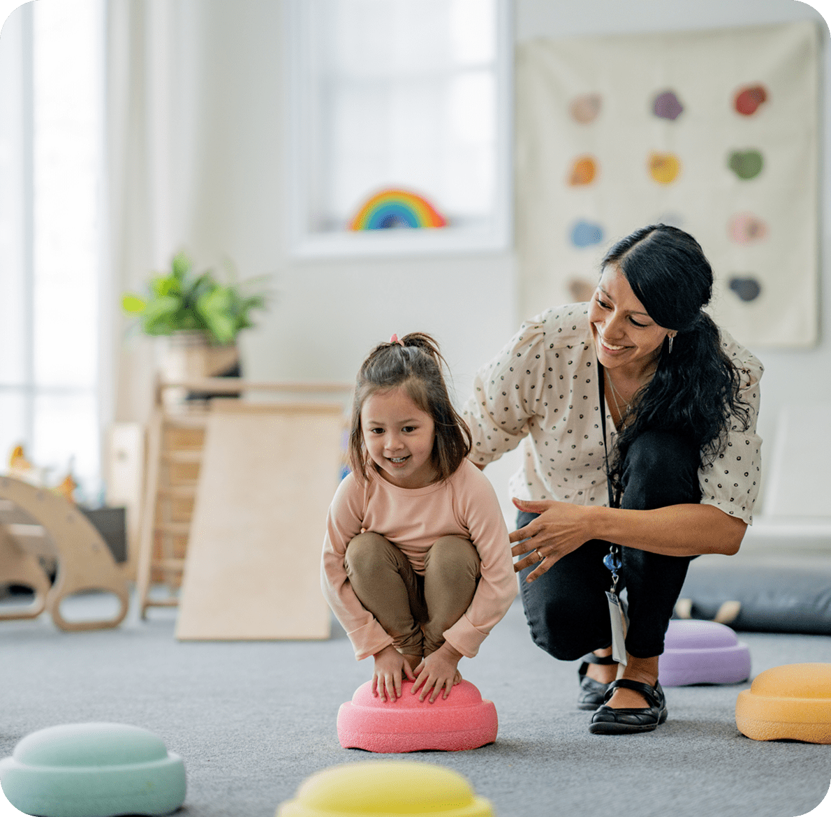 Classroom activity with child and teacher